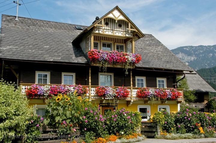 Pictures of Austria - Countryside - Mountains - traditional wooden house, geraniums