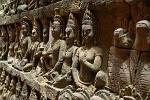 a wall of sculpted images