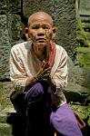 elderly woman praying