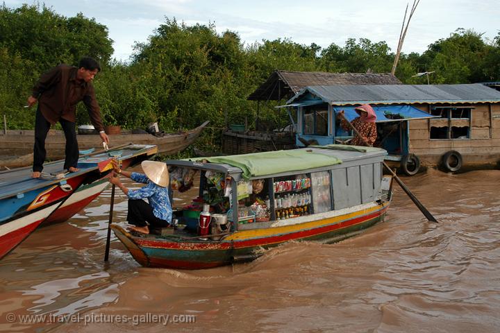 houseboats, floating grocery store on Tonle Sap Lake