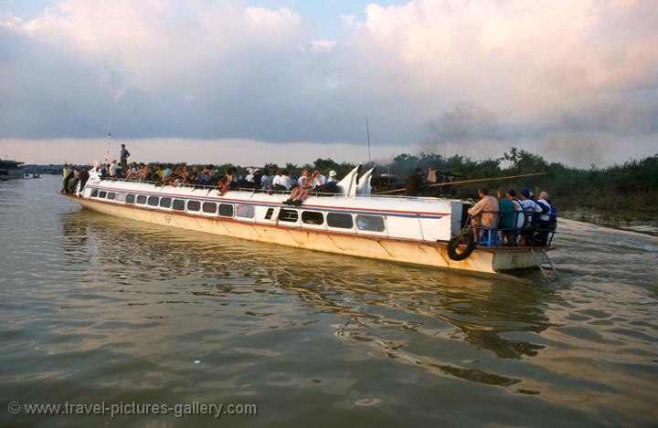 boat people of cambodia. on the oat from Siem Reap to