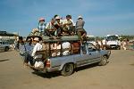 local transport, dozens of people in a pickup