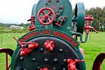German built steam tractor in a farm field