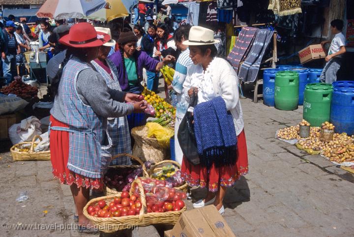 women in traditional indigenous dress at the market