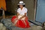 making traditional Panama hats from a special straw