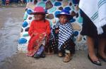 little girls in traditional dress