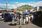 local market with Panecillo hill