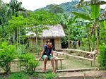 a girl in front of her house and garden