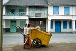 men collecting rubbish in Ampenan