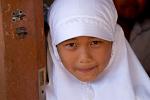 local girl in Mataram, traditional Muslim dress