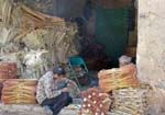 men making brooms at the bazaar