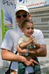 smiling father and son