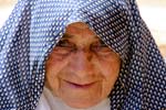 Pictures of Iran - Kharanaq - friendly old woman with headscarve