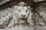 sculpted lion on a Tiber bridge
