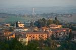 houses on the dge of town, rolling hills, Tuscany