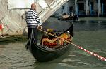 a Gondola under Rialto Bridge