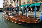a classic water taxi, stylish and fast