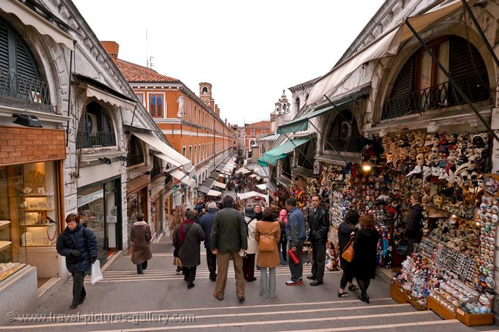 people and shops on the Rialto Bridge