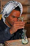 Bedouin man making souvenirs