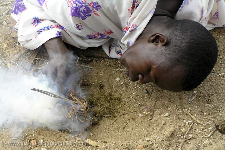 Masai man making a fire, Samburu N.P.