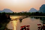 Nam Song River with bamboo bridge at sunset
