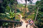 climbing to the entrance of Tham Jang cave