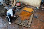 preparing a skin for making a Djembe, arts and crafts market