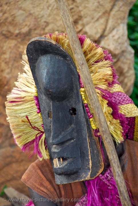 human masks depict hunters and warriors
