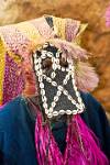 mask decorated with kauri shells