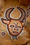 Dogon painting at a village shrine, Songo