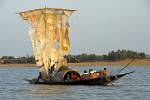 traditional boat sailing the river
