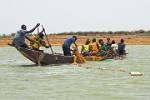 people fishing with a net
