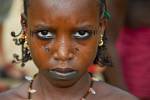 young girl with facial tattoos