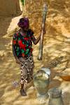 rural life, pounding corn