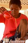 boy poring tea