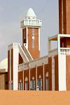 mosque, minaret on the edge of the desert
