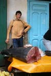 selling tuna in a coastal village