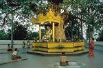 people paying their respects at the Shwedagon Pagoda