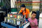 girl and boy selling cigarettes