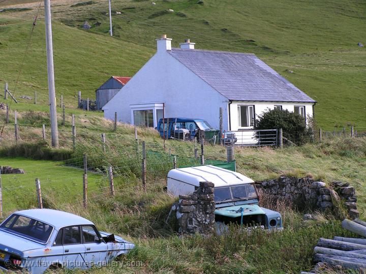 Isle of Skye, house and wrecked cars