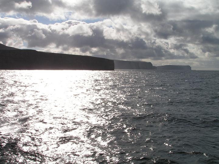 sunlight reflecting, Orkney Island coast