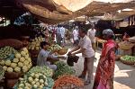 people buying vegetables, market scene