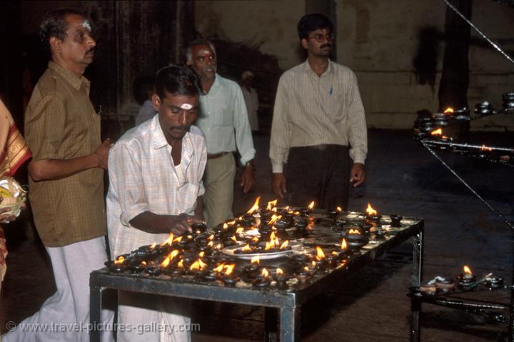 lighting oil lamps in respect of the gods