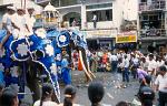 people offering coconuts