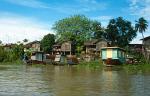 houses and house boats along the river