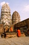 monks posing at Wat Si Sawai, Sukhothai Historical Park