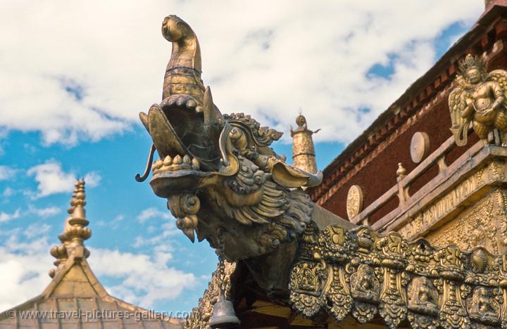 a gilded dragon at the Jokhang