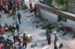 pilgrims prostrating in front of the Jokhang