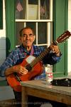 California - San Diego, elderly man playing guitar