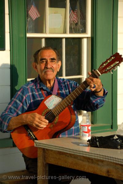 California - San Diego, elderly man playing guitar